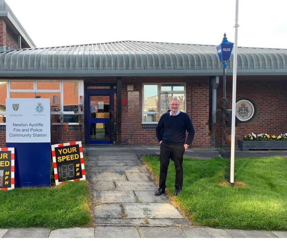 Paul Howell in front of Newton Aycliffe combined police and firestation